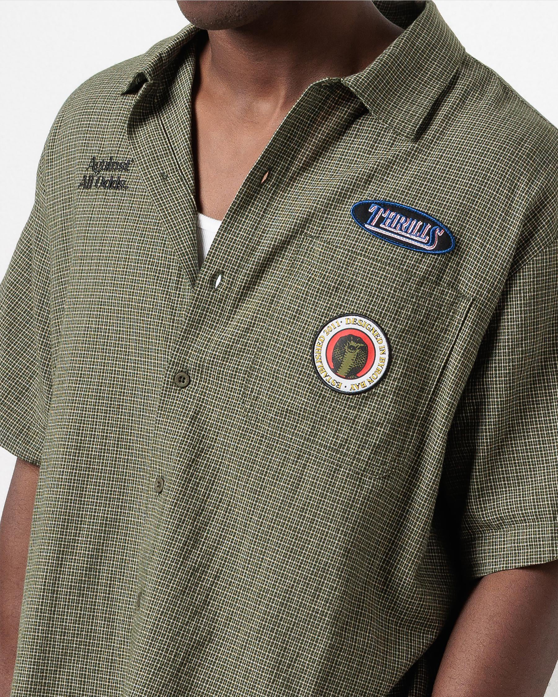 AGAINST ALL ODDS SS SHIRT OIL GREEN