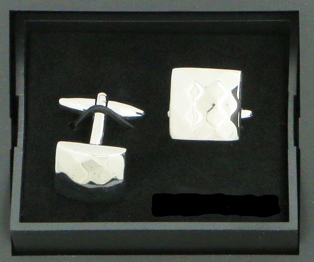 DH CUFFLINK 1